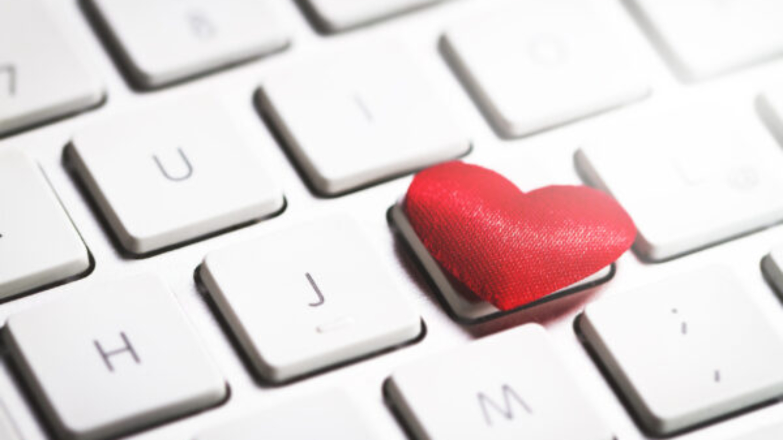 Red Hearts on a Keyboard. Love or Valentine's Day Concept